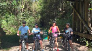 Cyclists at the end of the first stage of the Rail trail at Crabbes Creek,Kate Baker Cyclists at the end of the first stage of the Rail trail at Crabbes Creek