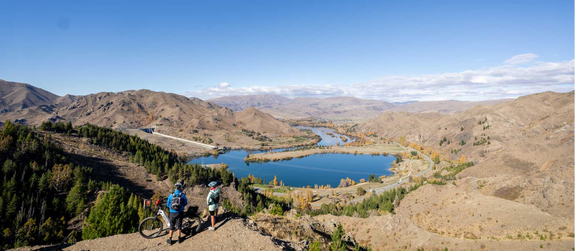 Cycling along the beautiful Benmore Dam on the Alps to Ocean. | Clare Toia-Bailey