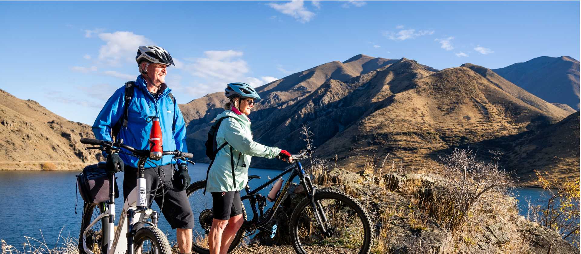 Cycling along the beautiful Benmore Dam on the Alps to Ocean. | Clare Toia-Bailey