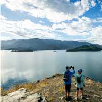 Cycling along the beautiful Benmore Dam on the Alps to Ocean. | Clare Toia-Bailey