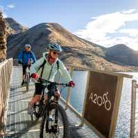 Cycling along the Benmore Dam. | Clare Toia-Bailey