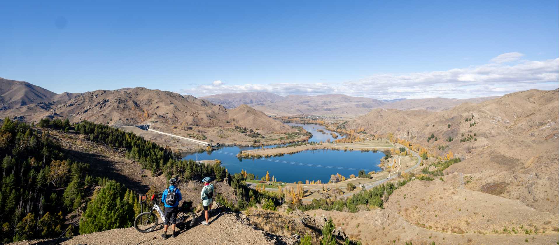 Cycling along the beautiful Benmore Dam on the Alps to Ocean. | Clare Toia-Bailey