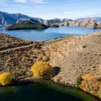 Cycling along the beautiful Benmore Dam on the Alps to Ocean. | Clare Toia-Bailey