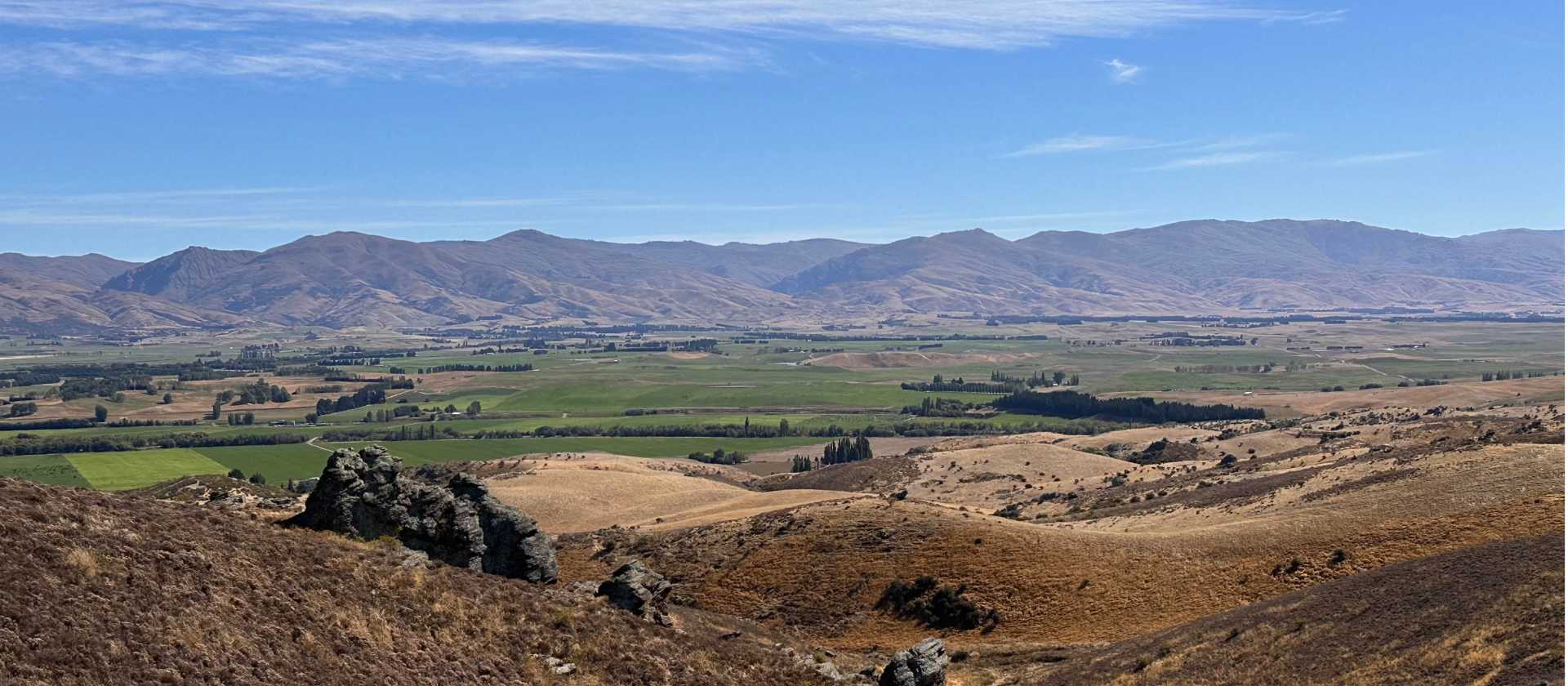 Looking out to the the wild thyme surrounding mountain ranges | Bec Adams