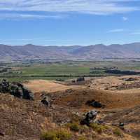 Looking out to the the wild thyme surrounding mountain ranges | Bec Adams