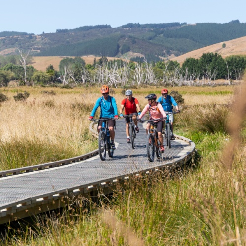 Soaking up the sun riding the Clutha board walk