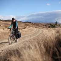 Cycling self guided along the Otago Rail Trail