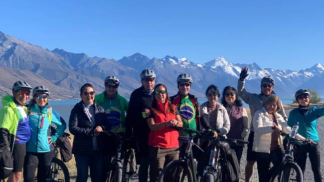 Happy cyclists on the Alps to Ocean trail