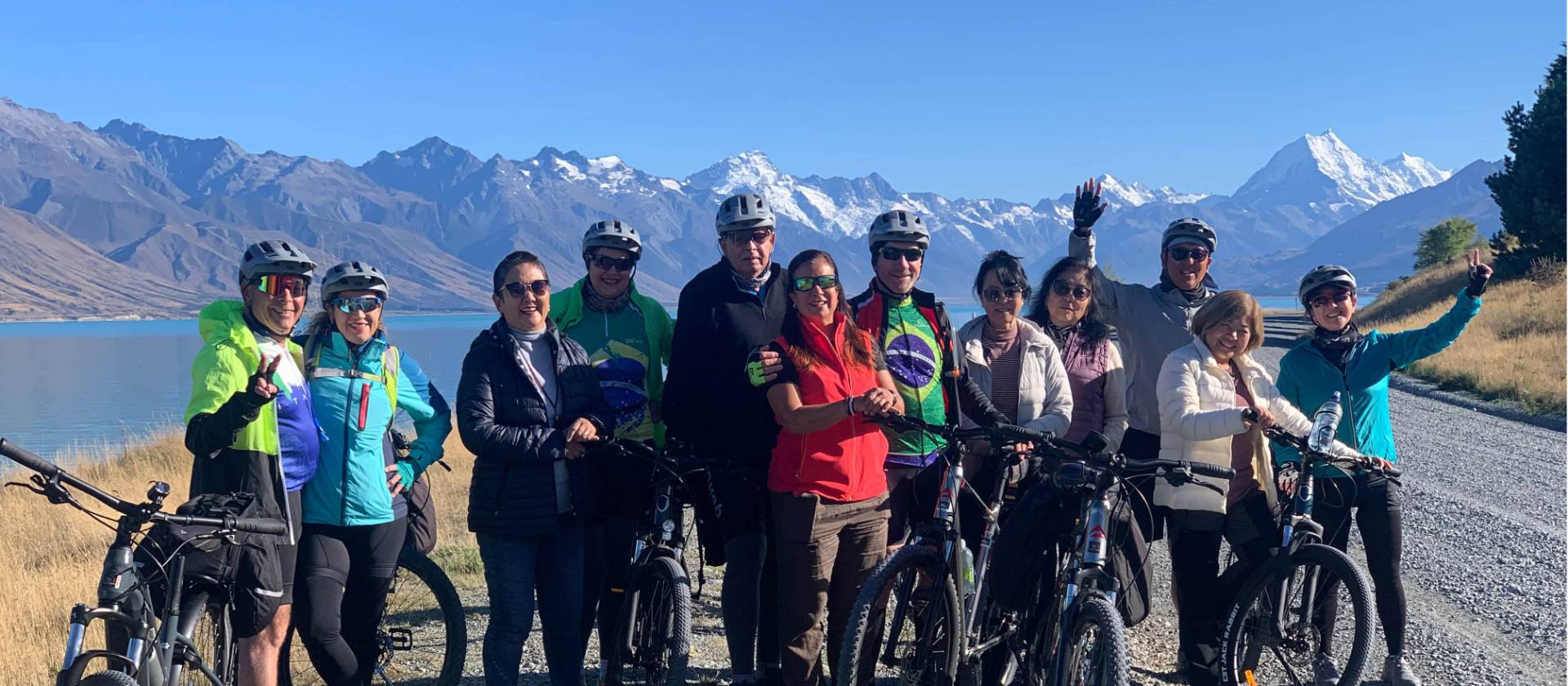 Happy cyclists on the Alps to Ocean trail