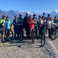 Happy cyclists on the Alps to Ocean trail