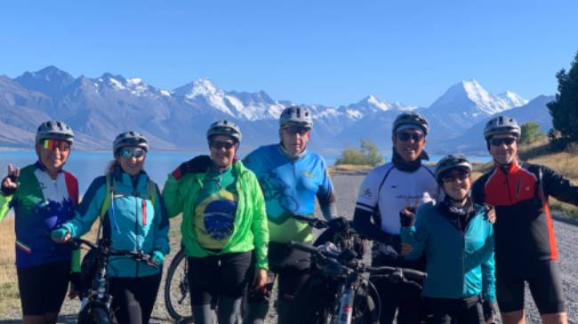 Happy cyclists on the Alps to Ocean trail