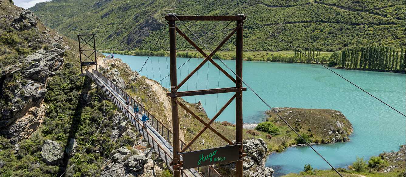 Cyclists ride across the Hugo Swingbridge | Geoff Marks