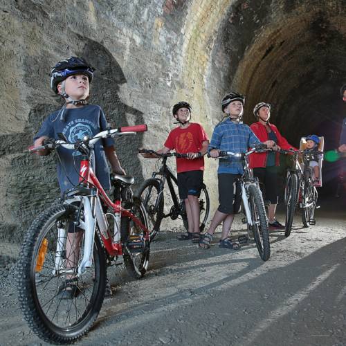 Head lamps on in the railway tunnel
