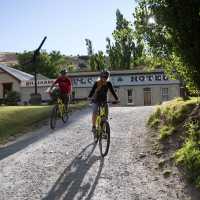 Cycling out from the Vulcan Hotel near St Bathans | Tom Powell