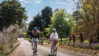 Cycling through Sevenhill Cellars in the Clare Valley,South Australian Tourism Commission Cycling through Sevenhill Cellars in the Clare Valley