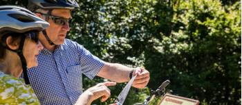 Planning the days' cycling on the Otago Central Rail Trail | Lachlan Gardiner